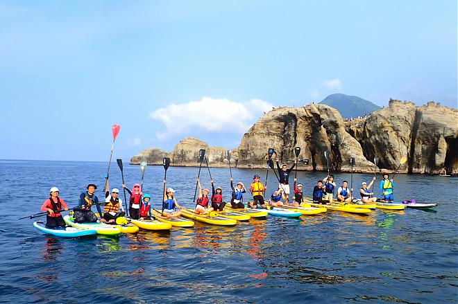 Experience SUP at Ruifang Elephant Trunk Rock and explore the unique rock formations on the north coast