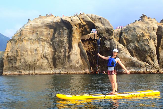 Experience SUP at Ruifang Elephant Trunk Rock and explore the unique rock formations on the north coast