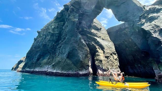 Ride the waves on Hydrobikes at Elephant Trunk Rock in Keelung | Free aerial photography
