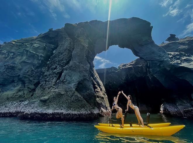 Ride the waves on Hydrobikes at Elephant Trunk Rock in Keelung | Free aerial photography